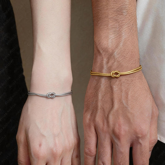 BODANCE Love Knot Double Layer Gold Chain Bracelet for women on a white background.